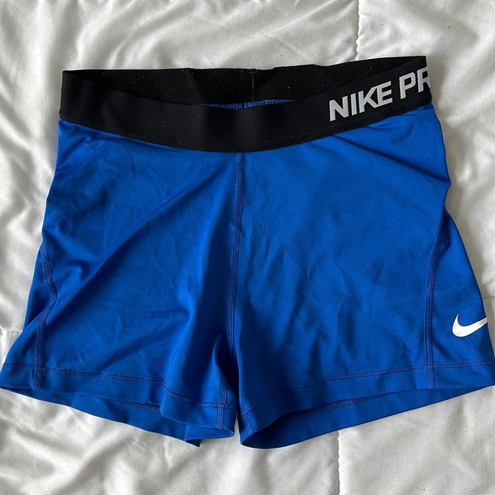 Blue Nike Dri Fit athletic shorts